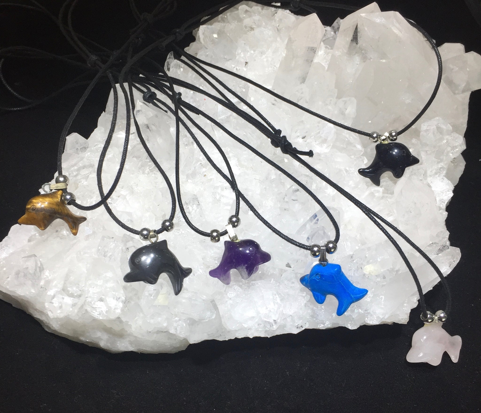 Dolphin necklace on sale with blue stone