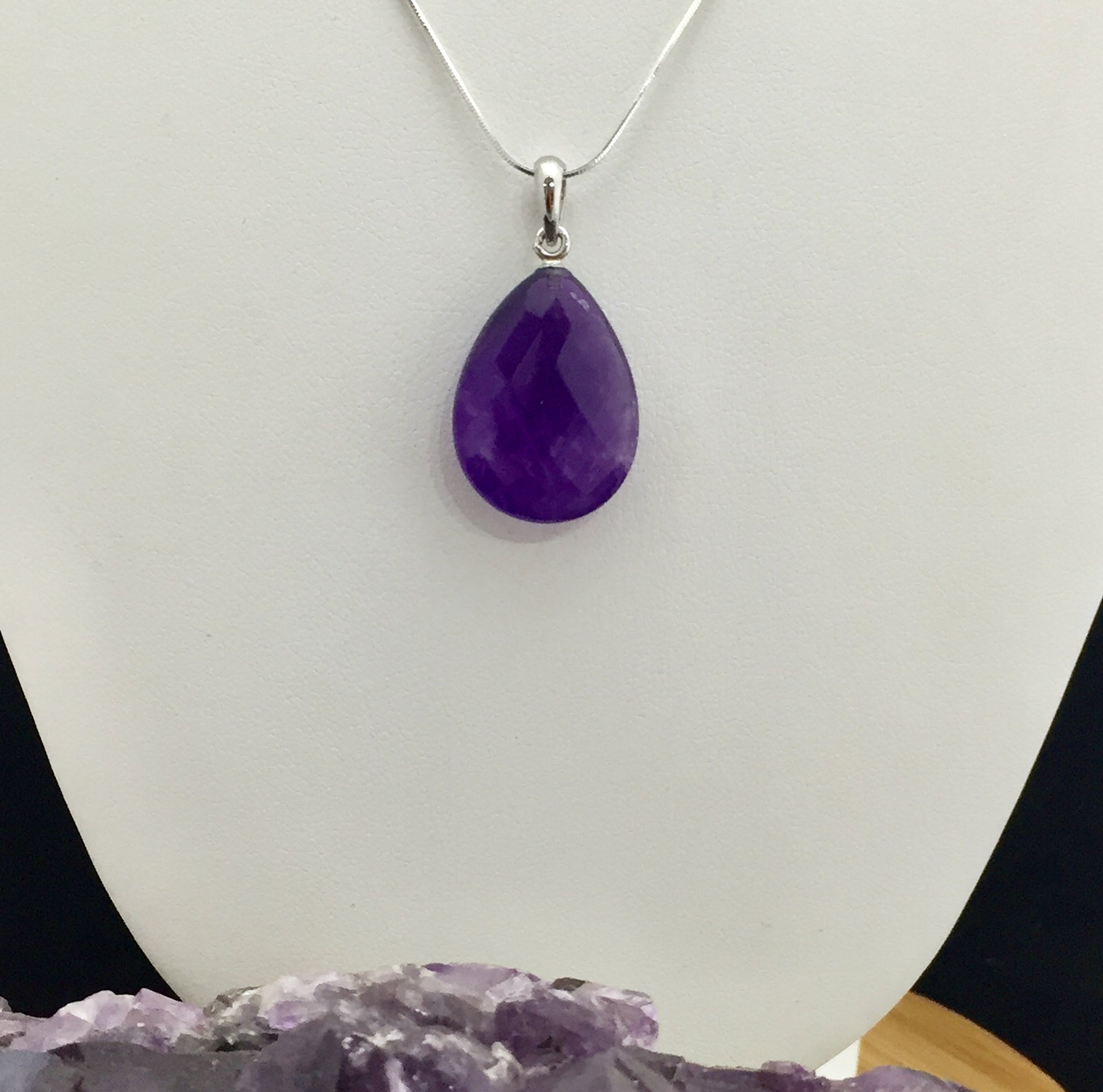 Purple stone pendant deals